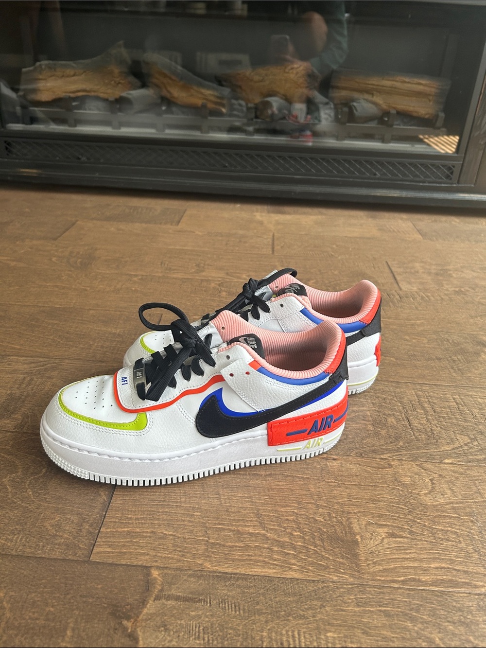Nike White Sneakers with Black Swoosh and Multicolor Accents